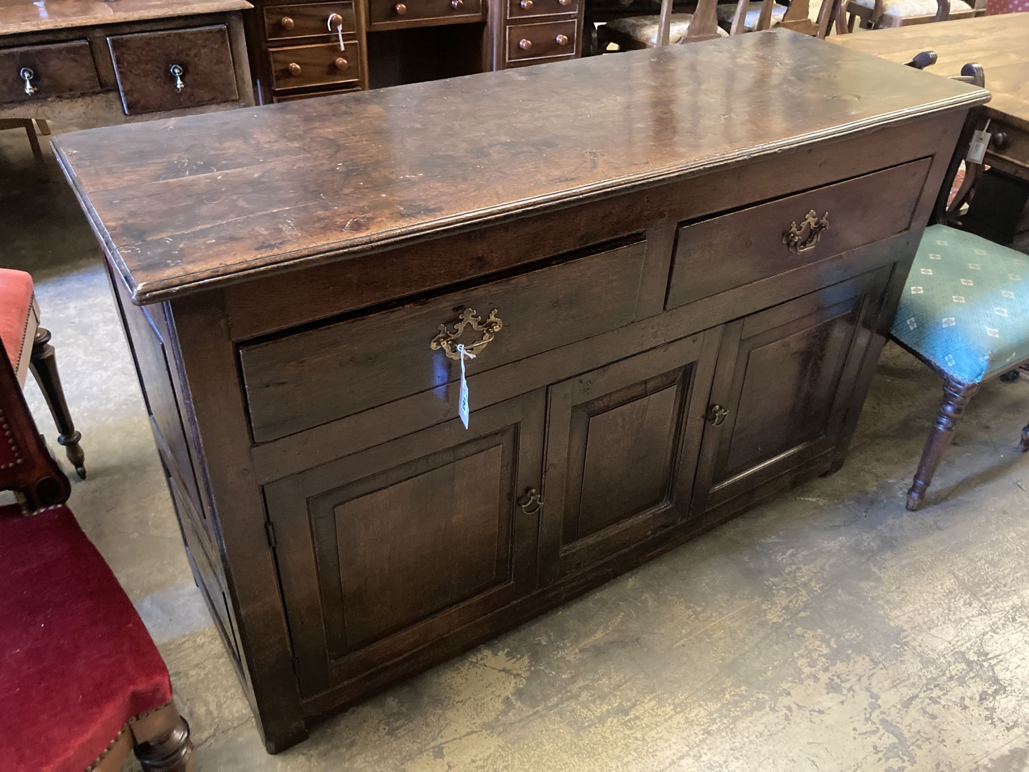 An 18th century oak dresser base, width 142cm, depth 48cm, height 87cm